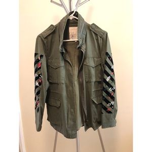 Embroidered sleeve military jacket.